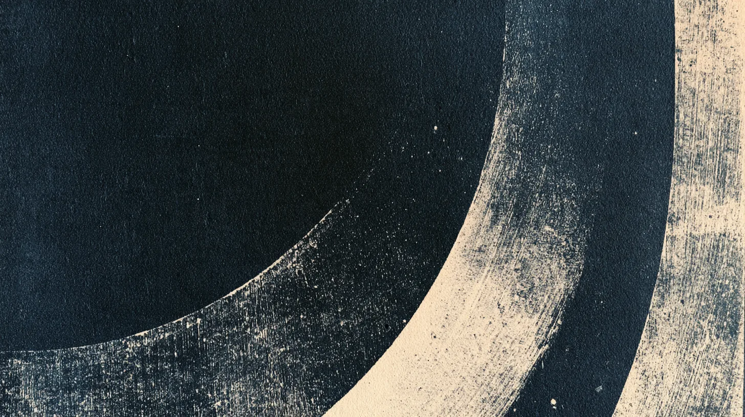 A risograph print: a wide cream brush circle sweeping across dark indigo paper.